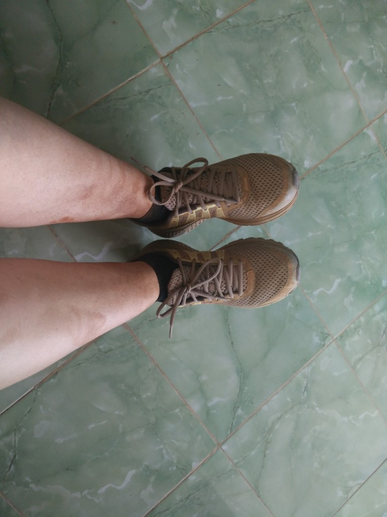 My legs covered in red dust after the trek - and it was even worse the day before :)