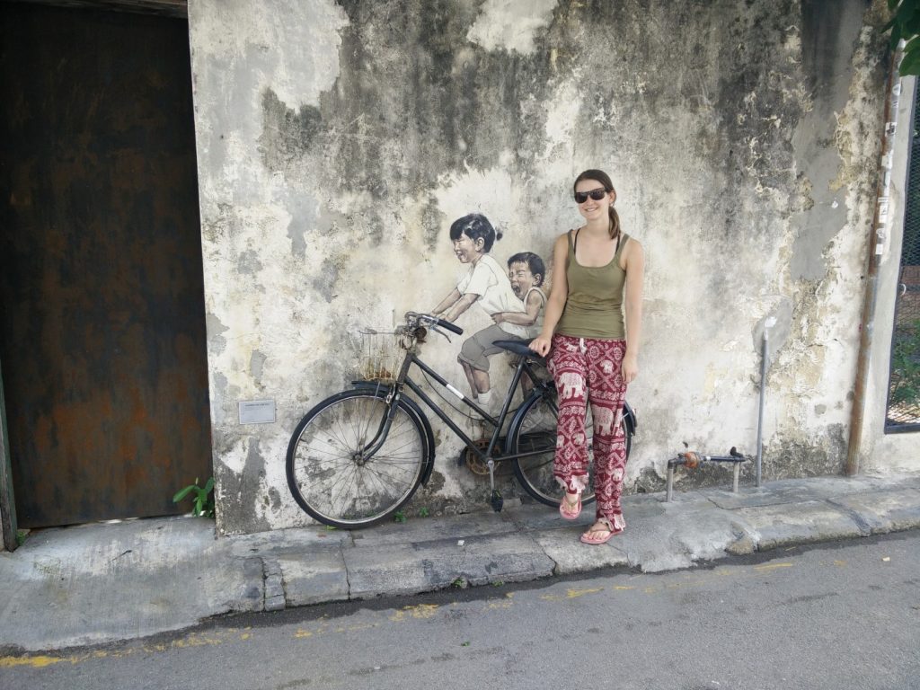 Me with street art in Georgetown. 