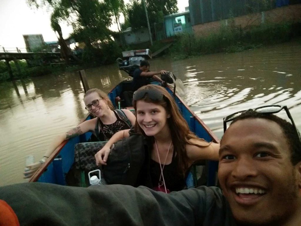 Selfie while our host was getting the water out of the boat and starting the engine. 